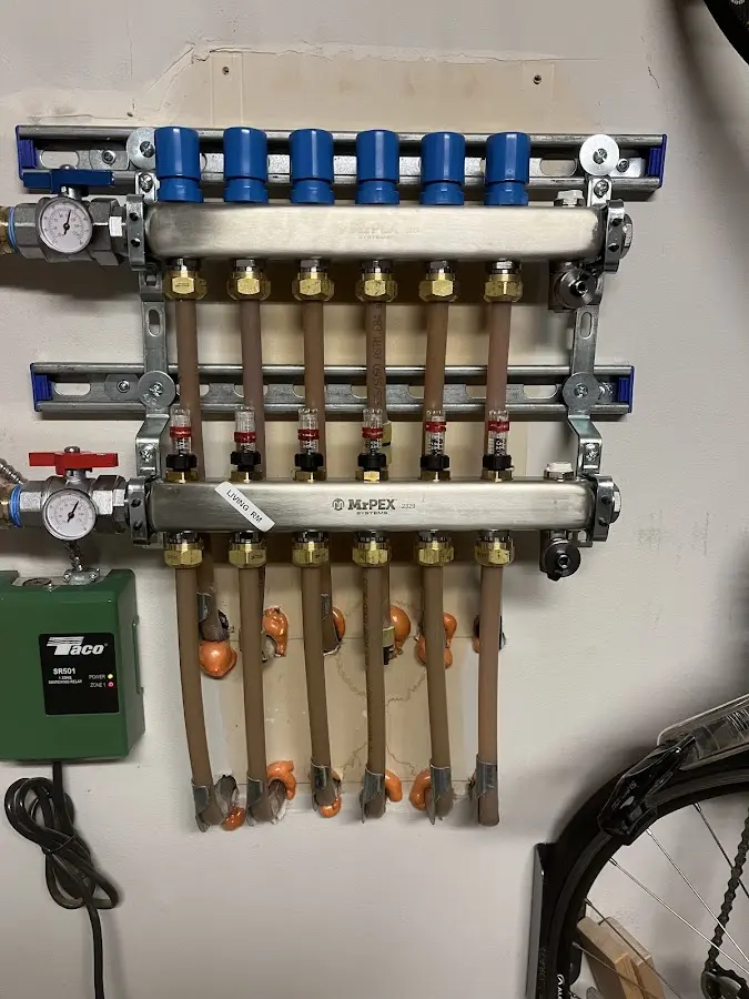 Plumber performing Water Heater Repair at a residential property in St. Simons